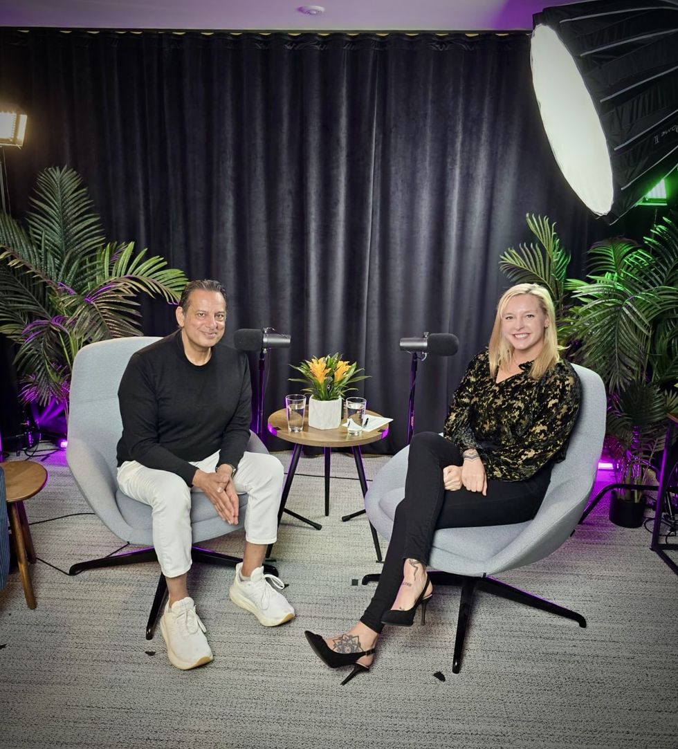 Lindsay Poss interviews Wasim Ahmad, Vault12 on the Seeking Alpha Podcast sitting in chairs doing an interview