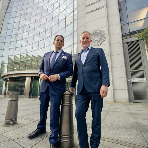 Wasim Ahmad and Phil Berg outside the SEC