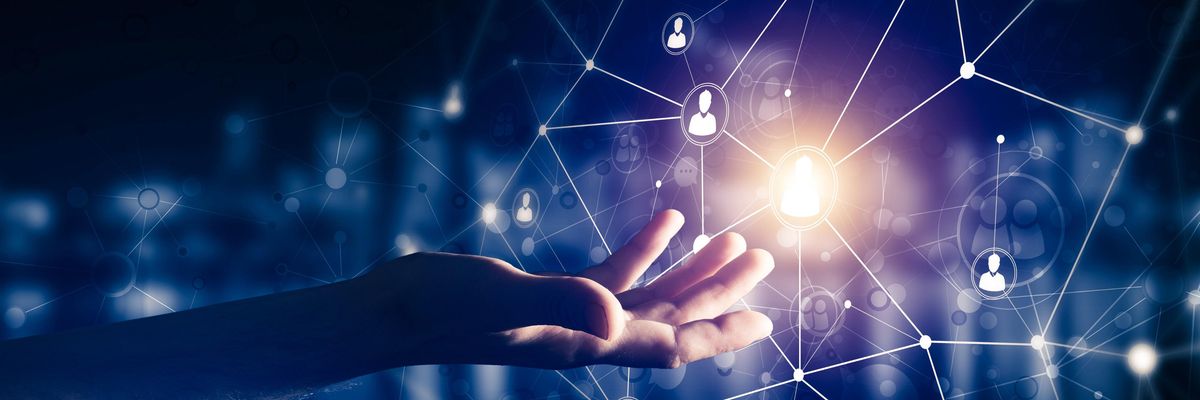Image of hand inside digital network