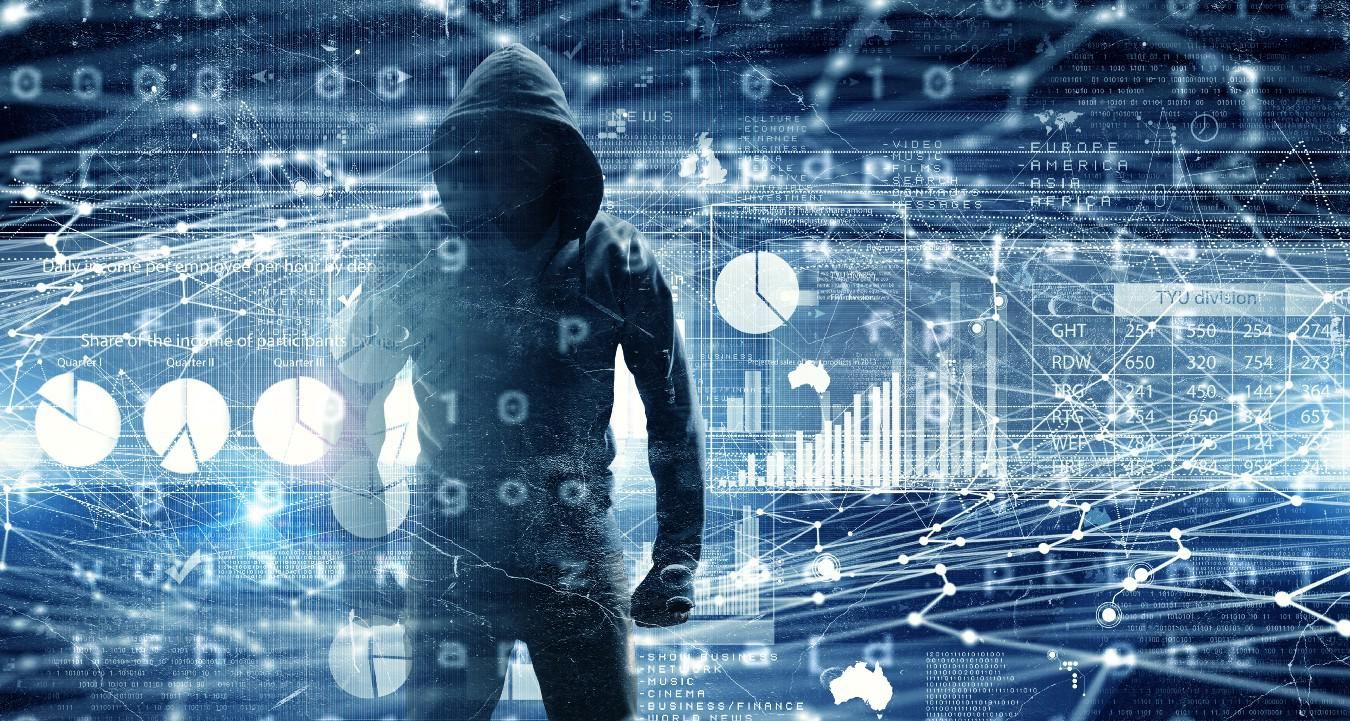 Hacker superimposed on digital charts