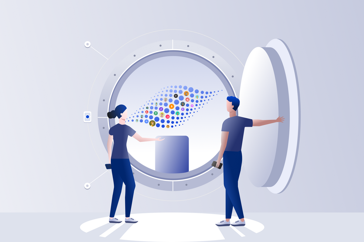 Two people opening a large Vault with digital assets